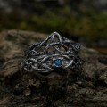 Gothic Blue Topaz Ring with Intricate Celtic Knot Motif