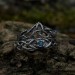 Gothic Blue Topaz Ring with Intricate Celtic Knot Motif