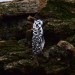Delicate Silver Band with Intricate Weaving Design