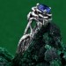 Enchanting Floral Sterling Silver Ring with Blue Sapphire Glow