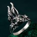 Nature's Embrace: Silver Ring with Leaf Motif and Peridot Gem