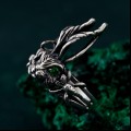 Nature's Embrace: Silver Ring with Leaf Motif and Peridot Gem