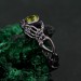Sterling Silver Celtic Knot Ring with Peridot - Artisan Crafted Mystical Jewelry