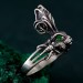 Nature's Embrace: Silver Ring with Leaf Motif and Peridot Gem