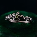 Gothic Silver Ring with Peridot and Flower Motif