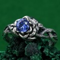 Enchanting Floral Sterling Silver Ring with Blue Sapphire Glow