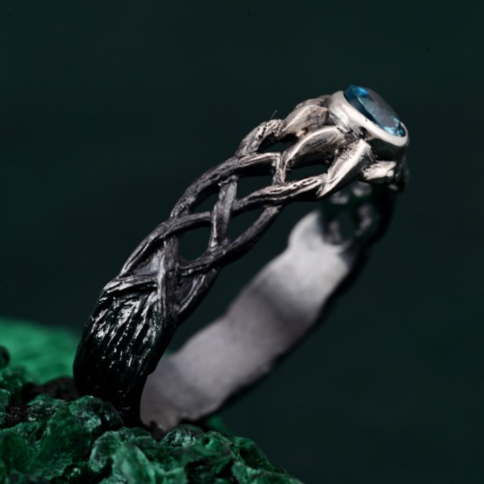 Waves of Serenity: Gothic Blue Topaz Ring