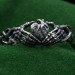 Grasp of the Heart: Gothic Skeleton Hands Ring