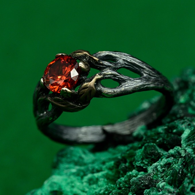 Mystical Forest Ring with Garnet and Leafy Blossom Design