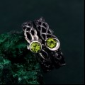 Dual Essence: Gothic Peridot Ring