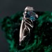 Gothic Silver Ring with Sapphire and Flowing Design