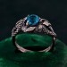 Azure Coil: Gothic Snake Ring with Blue Topaz