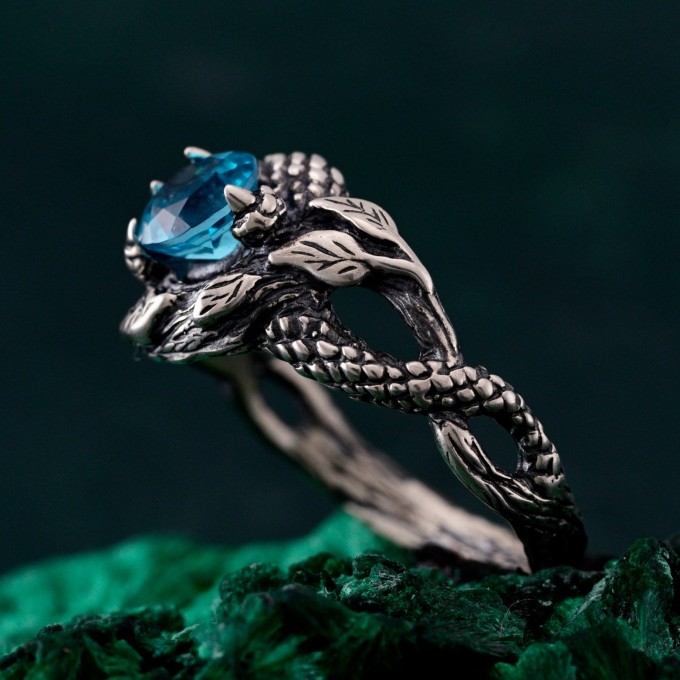 Azure Coil: Gothic Snake Ring with Blue Topaz