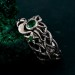 Gothic Silver Ring with Emerald and Radiant Motif