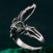 Nature's Embrace: Silver Ring with Leaf Motif and Peridot Gem