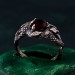 Garnet Serpent Ring with Vintage Dragon Scale Design
