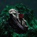 Leafy Branch with Garnet Ring – Nature-Inspired Silver Twig Jewelry