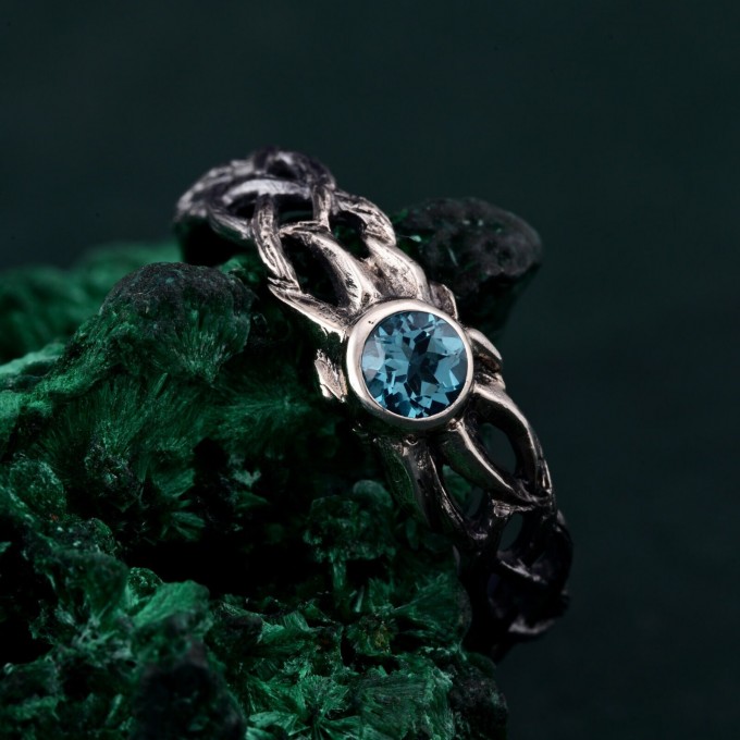 Waves of Serenity: Gothic Blue Topaz Ring