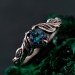 Gothic Silver Ring with Sapphire and Flowing Design