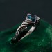 Gothic Silver Ring with Sapphire and Flowing Design