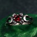 Gothic Silver Ring with Garnet and Moon Phases Design