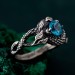 Azure Coil: Gothic Snake Ring with Blue Topaz