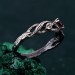 Leafy Branch with Garnet Ring – Nature-Inspired Silver Twig Jewelry