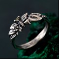 Enchanted Forest Peridot Twig Ring with Unique Butterfly Design