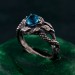 Azure Coil: Gothic Snake Ring with Blue Topaz