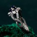 Coiled Majesty: Gothic Sapphire Snake Ring